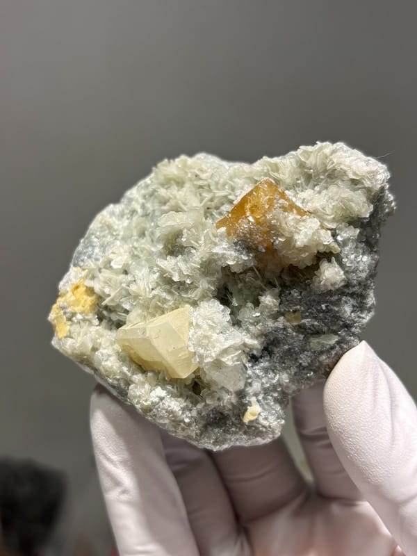 Scheelite plate with quartz, aquamarine and mica from Xuebaoding, Sichuan, China, view 7 of 7
