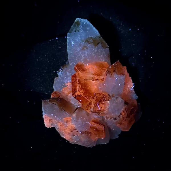 Orange-skinned calcite crystals with clear quartz points from Fujian, China, view 5 of 13