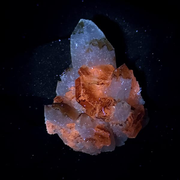 Orange-skinned calcite crystals with clear quartz points from Fujian, China, view 7 of 13