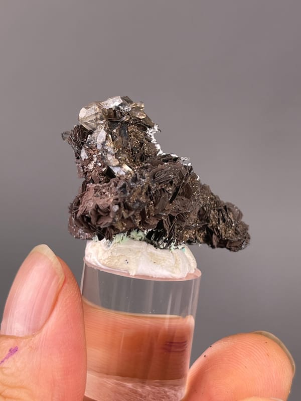 Specular Hematite specimen from Jinlong, Guangdong, China highlighting dark radial hematite rosettes