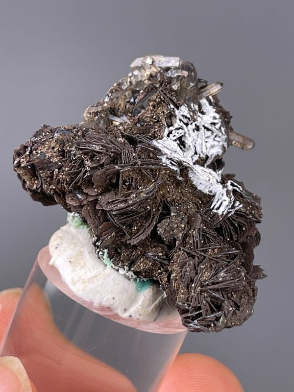 Specular Hematite specimen from Jinlong, Guangdong, China bearing dark radial hematite rosettes