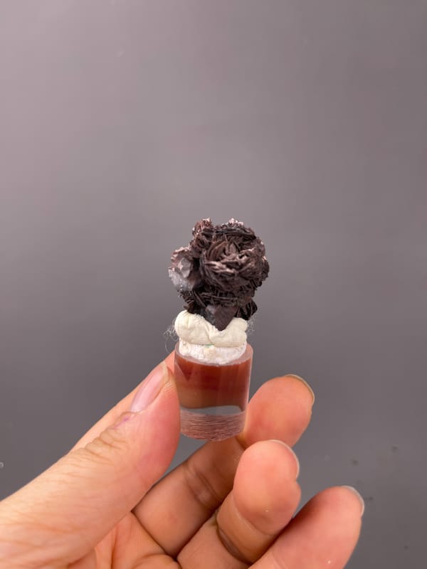 Specularite specimen from Jinlong, Guangdong, China highlighting dark bladed specularite rosette