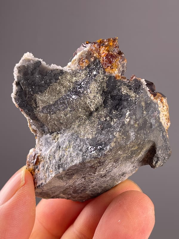 Sphalerite specimen from Hunan, China showcasing reddish-brown resinous crystals