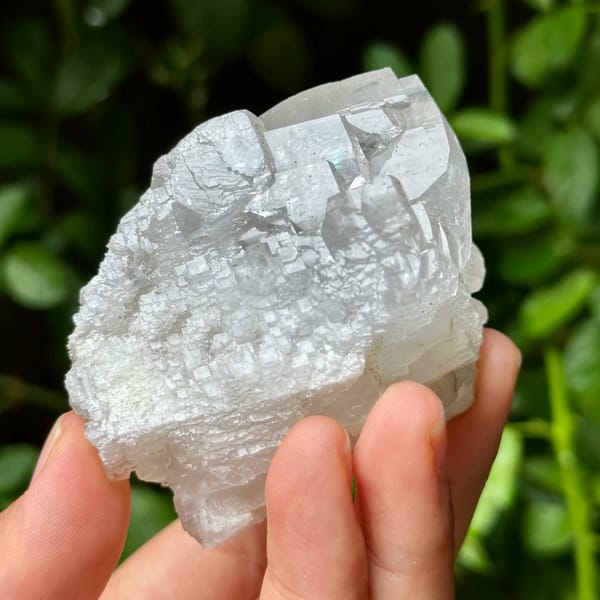 Stepped calcite crystals, from Yaogangxian Mine, Hunan, China, front view in daylight, view 4 of 12