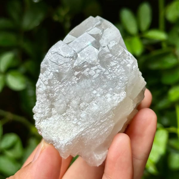 Stepped calcite crystals, from Yaogangxian Mine, Hunan, China, front view in daylight, view 5 of 12