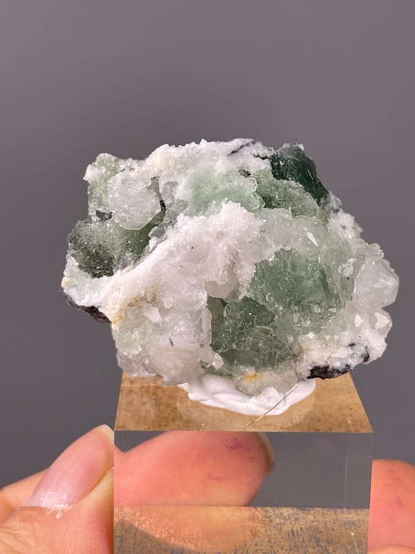 Stepped Fluorite specimen from Fujian, China showing translucent green fluorite with white druse