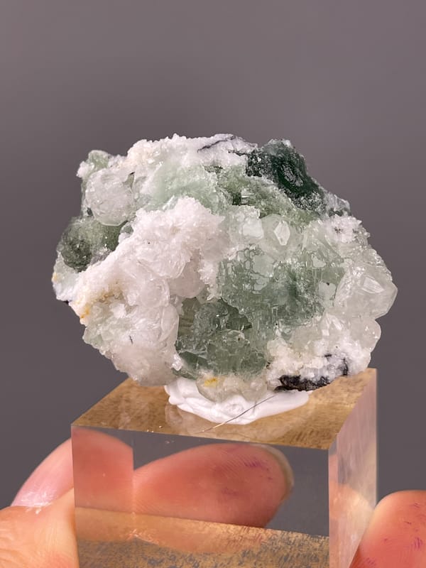Stepped Fluorite specimen from Fujian, China, defined by translucent green fluorite with white druse