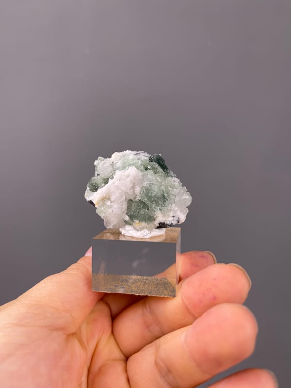 Translucent green fluorite with white druse on natural stepped fluorite specimen from Fujian, China