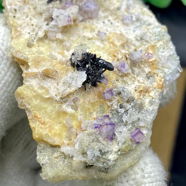 Grey stibnite blades with purple fluorite on pale matrix from Shangbao, Hunan, China, view 2 of 9