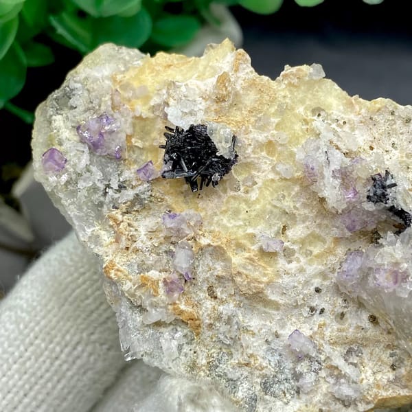 Grey stibnite blades with purple fluorite on pale matrix from Shangbao, Hunan, China, view 7 of 9