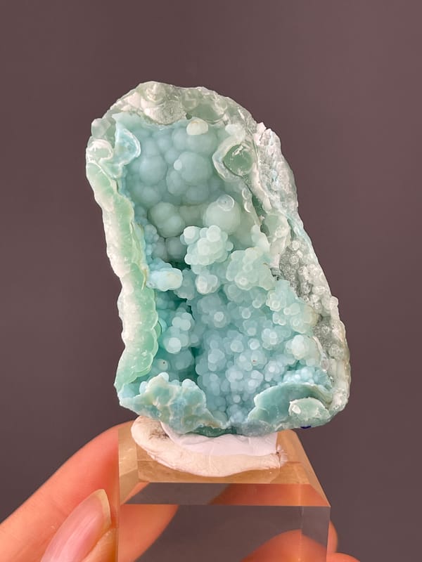 Strontianite specimen from Yunnan, China showing pale blue botryoidal spheres