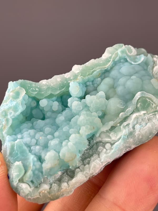 Strontianite specimen from Yunnan, China displaying pale blue botryoidal spheres