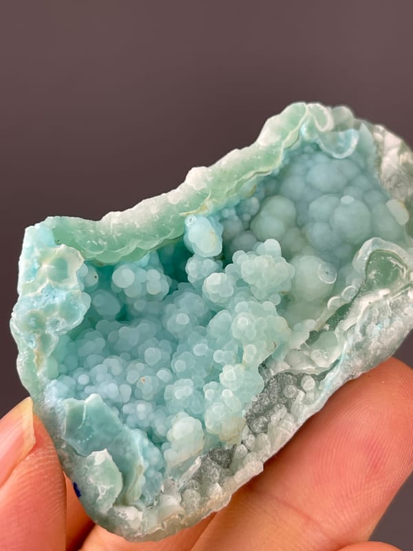 Pale blue botryoidal spheres on natural strontianite specimen from Yunnan, China