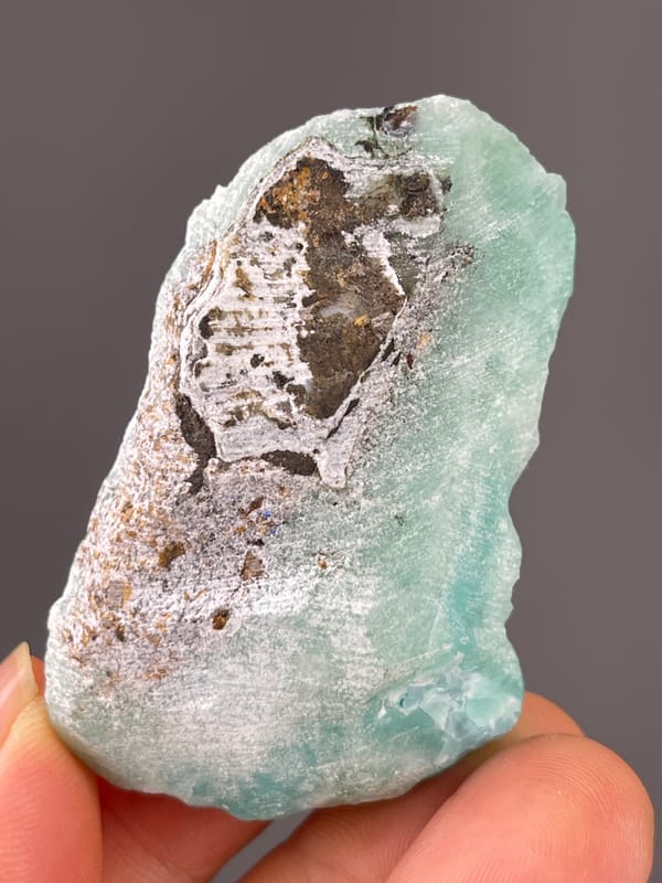 Strontianite specimen from Yunnan, China highlighting pale blue botryoidal spheres