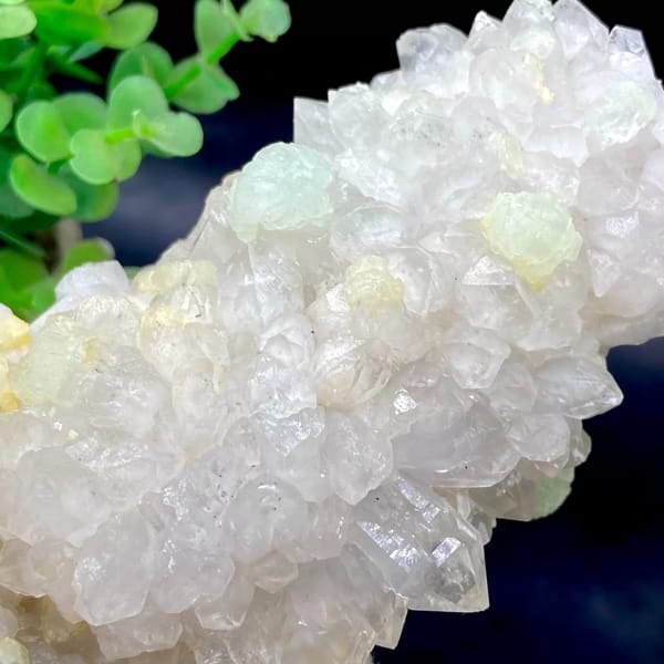 Tall white quartz cluster with pale green prehnite balls from Sichuan, China, view 3 of 9