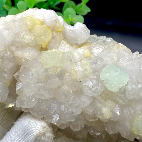 Tall white quartz cluster with pale green prehnite balls from Sichuan, China, view 4 of 9