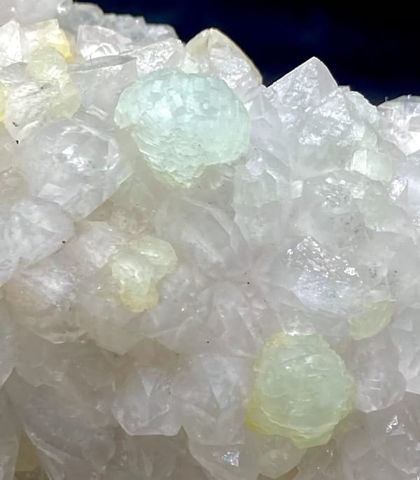 Tall white quartz cluster with pale green prehnite balls from Sichuan, China, view 5 of 9
