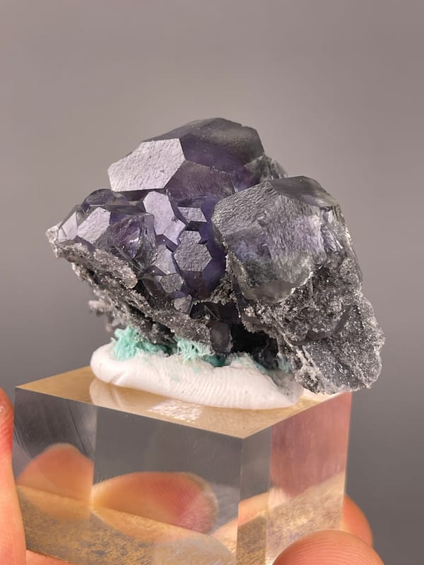 Tanzanite-blue Fluorite specimen from Yongchun, Fujian, China presenting dark purple fluorite with green patch