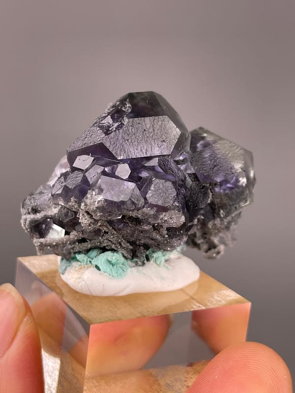 Tanzanite-blue Fluorite specimen from Yongchun, Fujian, China displaying dark purple fluorite with green patch