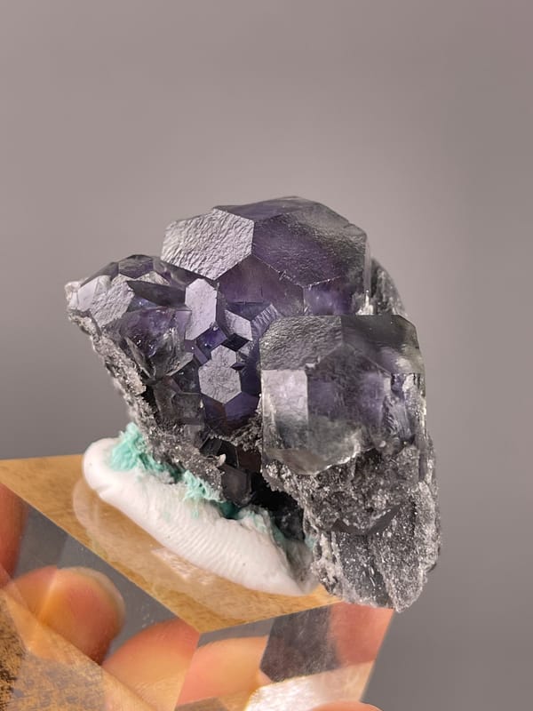 Tanzanite-blue Fluorite specimen from Yongchun, Fujian, China bearing dark purple fluorite with green patch