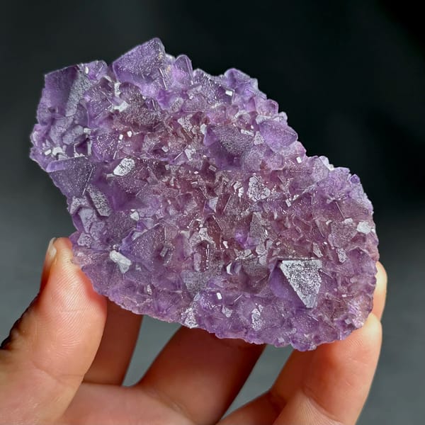 Thin translucent purple octahedral fluorite plate from Zhejiang, China, view 3 of 13