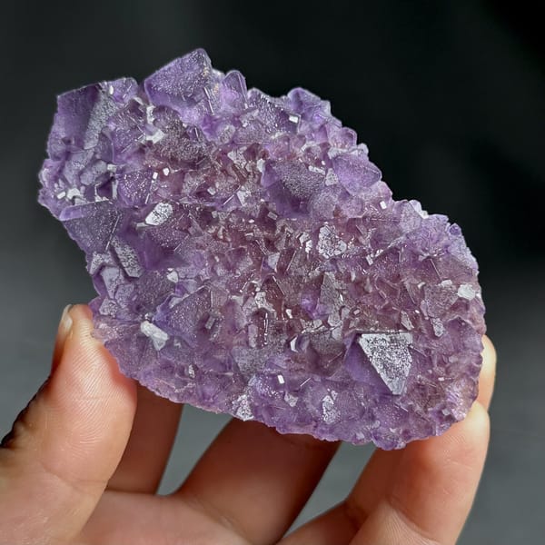 Thin translucent purple octahedral fluorite plate from Zhejiang, China, view 8 of 13