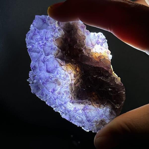 Thin translucent purple octahedral fluorite plate from Zhejiang, China, view 12 of 13