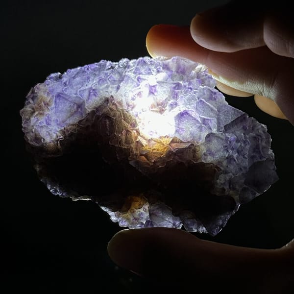 Thin translucent purple octahedral fluorite plate from Zhejiang, China, view 13 of 13