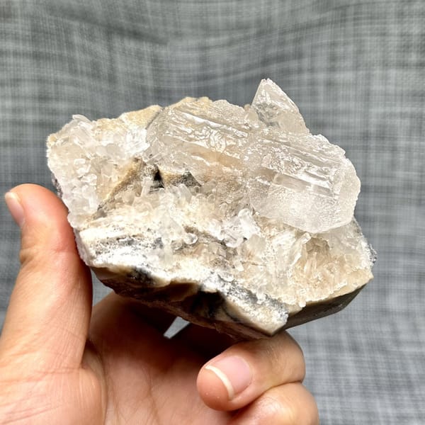 Translucent white baryte block with tabular blades from Jinkouhe, Sichuan, China, view 8 of 12
