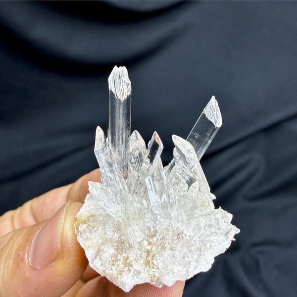 Spray of transparent gypsum selenite blades from Guizhou, China, view 6 of 6