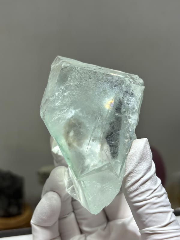Transparent pale fluorite with rainbow flash from Xuebaoding, Sichuan, China, top view