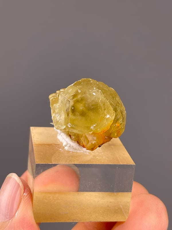 Unidentified specimen from Daye, Hubei, China: frontal view showing translucent yellow and cloudy internal areas.