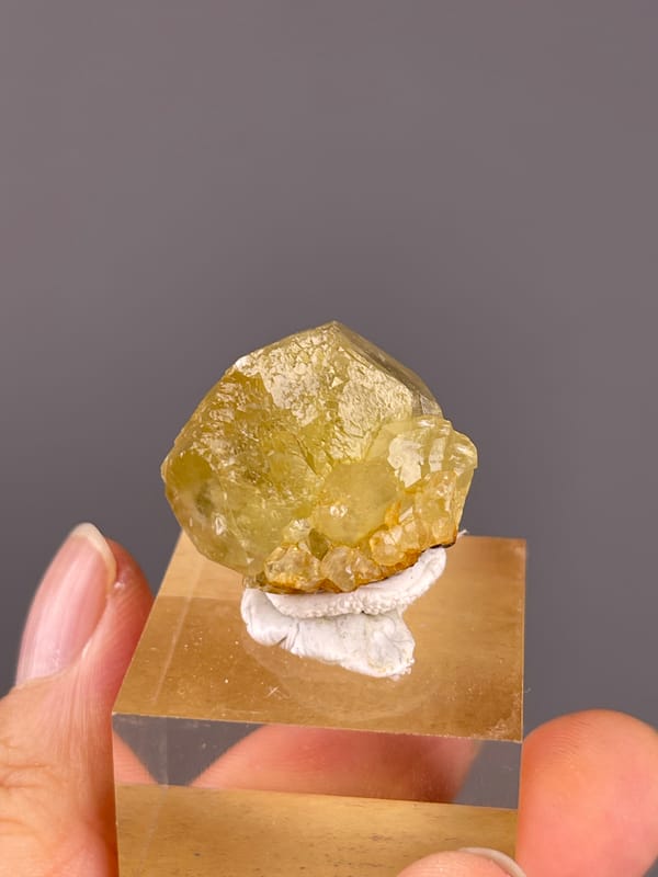 Unidentified specimen from Daye, Hubei, China: rotated rear view of the granular yellow surface.