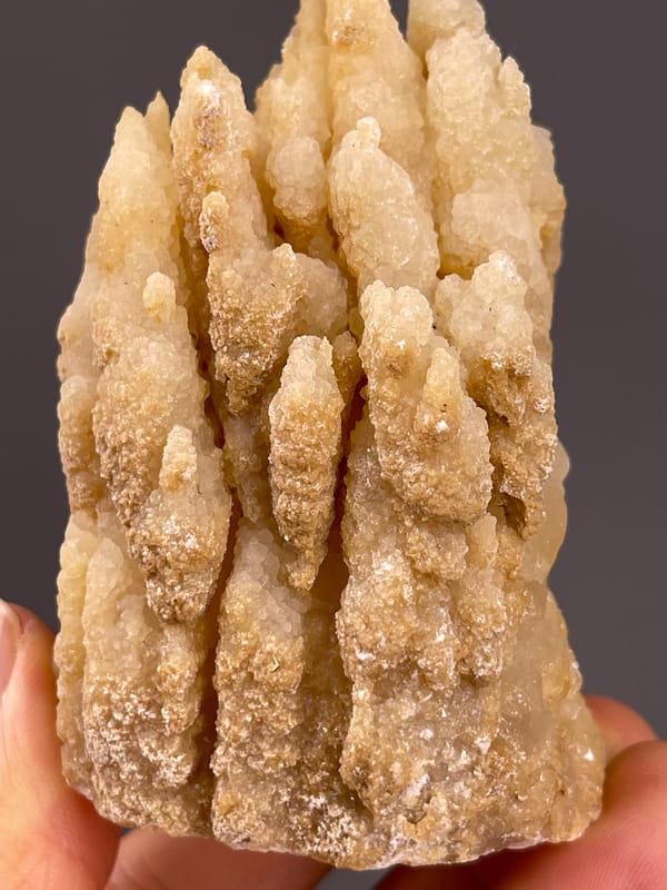 Unidentified specimen from Yunnan, China: close lower front showing narrow vertical ridges.