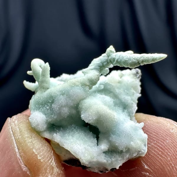 Fuzzy blue-green stalactitic aragonite thumbnail specimen from Yunnan, China, view 2 of 6