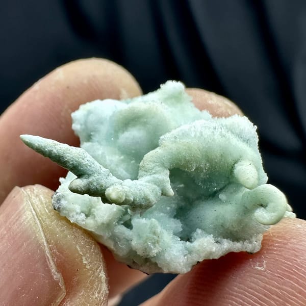 Fuzzy blue-green stalactitic aragonite thumbnail specimen from Yunnan, China, view 3 of 6