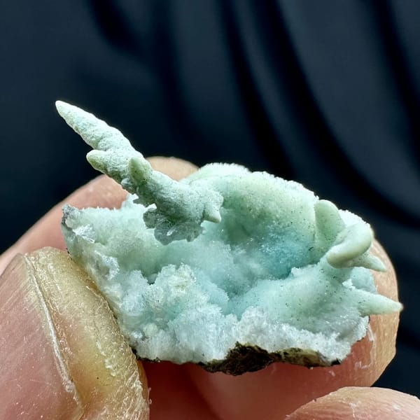 Fuzzy blue-green stalactitic aragonite thumbnail specimen from Yunnan, China, view 5 of 6