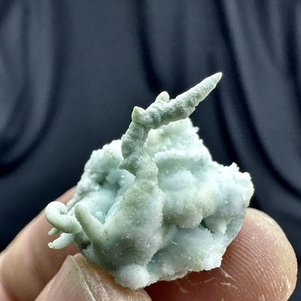 Fuzzy blue-green stalactitic aragonite thumbnail specimen from Yunnan, China, view 6 of 6
