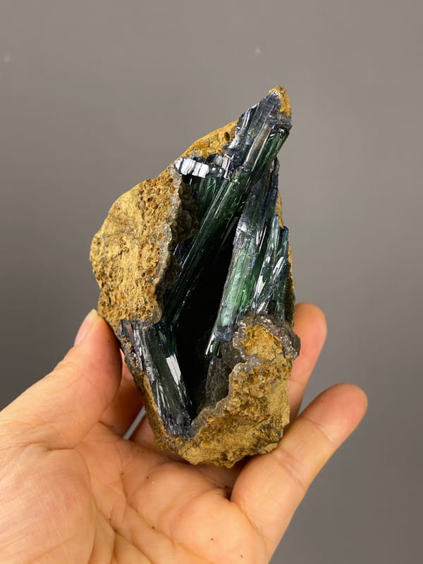 Vivianite specimen from Brazil, detailed with dark green-black striated blades