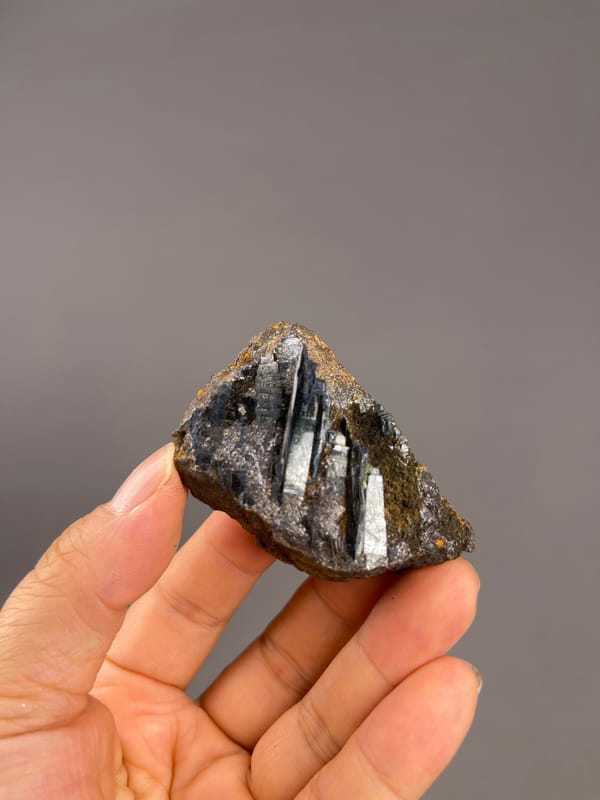 Vivianite from Brazil: whole broad specimen above the palm.