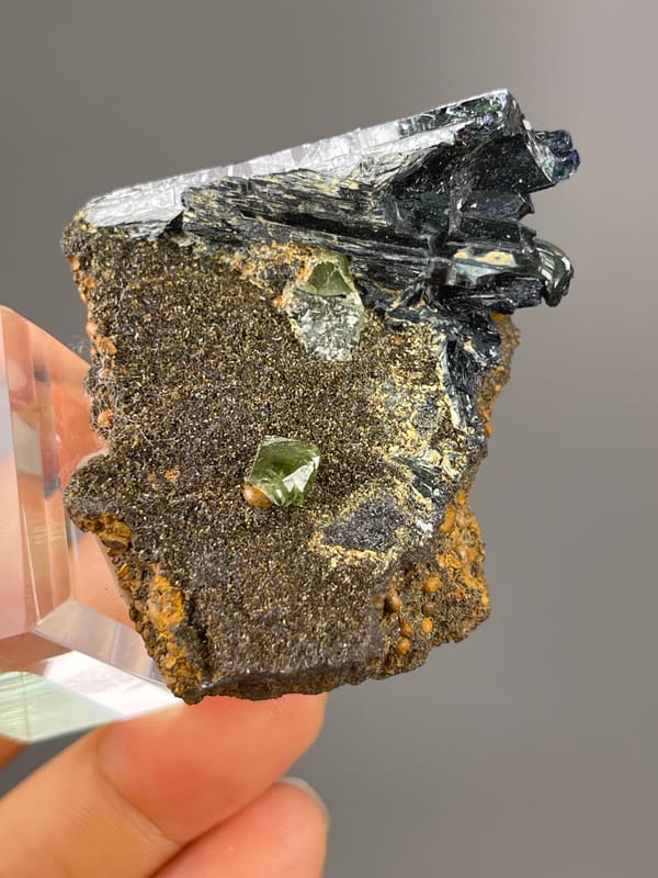 Vivianite specimen from Brazil, characterized by black striated blades on brown matrix