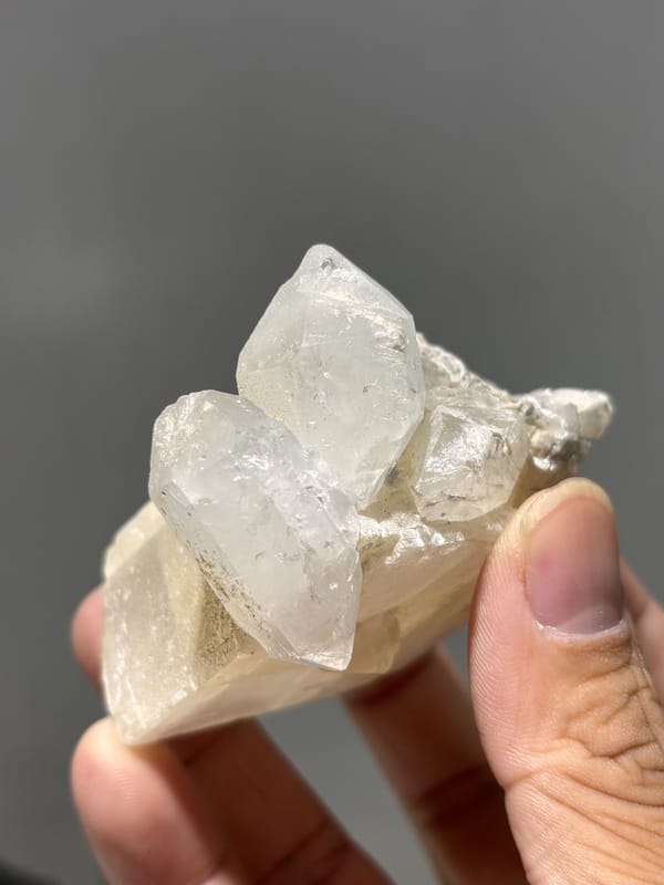 White calcite block with clear quartz crystal from Xuebaoding, Sichuan, China, reverse side