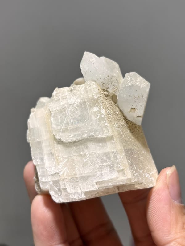 White calcite block with clear quartz crystal from Xuebaoding, Sichuan, China, top view