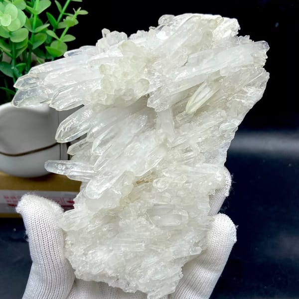 Plate of clear white quartz points from Jinkouhe, Sichuan, China, view 3 of 9