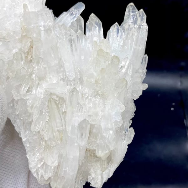 Plate of clear white quartz points from Jinkouhe, Sichuan, China, view 5 of 9