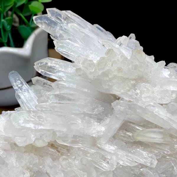 Plate of clear white quartz points from Jinkouhe, Sichuan, China, view 9 of 9