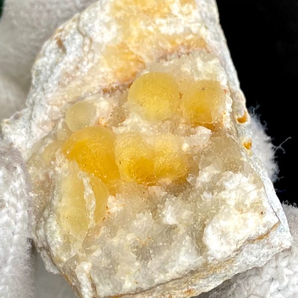 Honey-yellow botryoidal fluorite in white pocket from Henan, China, view 3 of 9