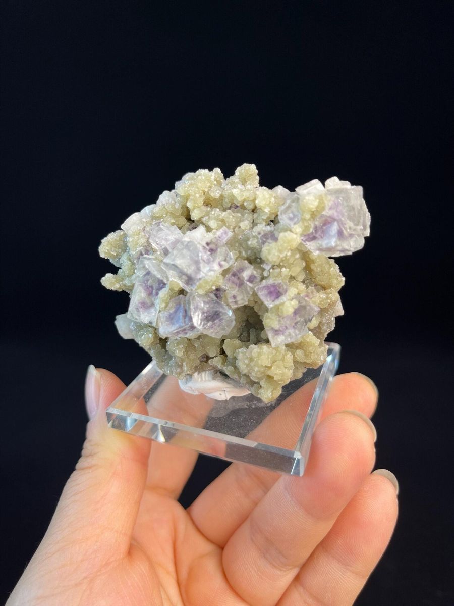 Natural purple phantom fluorite cube from Yaogangxian showing internal color zoning